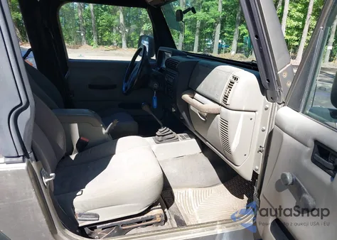 2003 Jeep Wrangler Sport z USA, uszkodzony, nr VIN 1J4FA49S13P313180